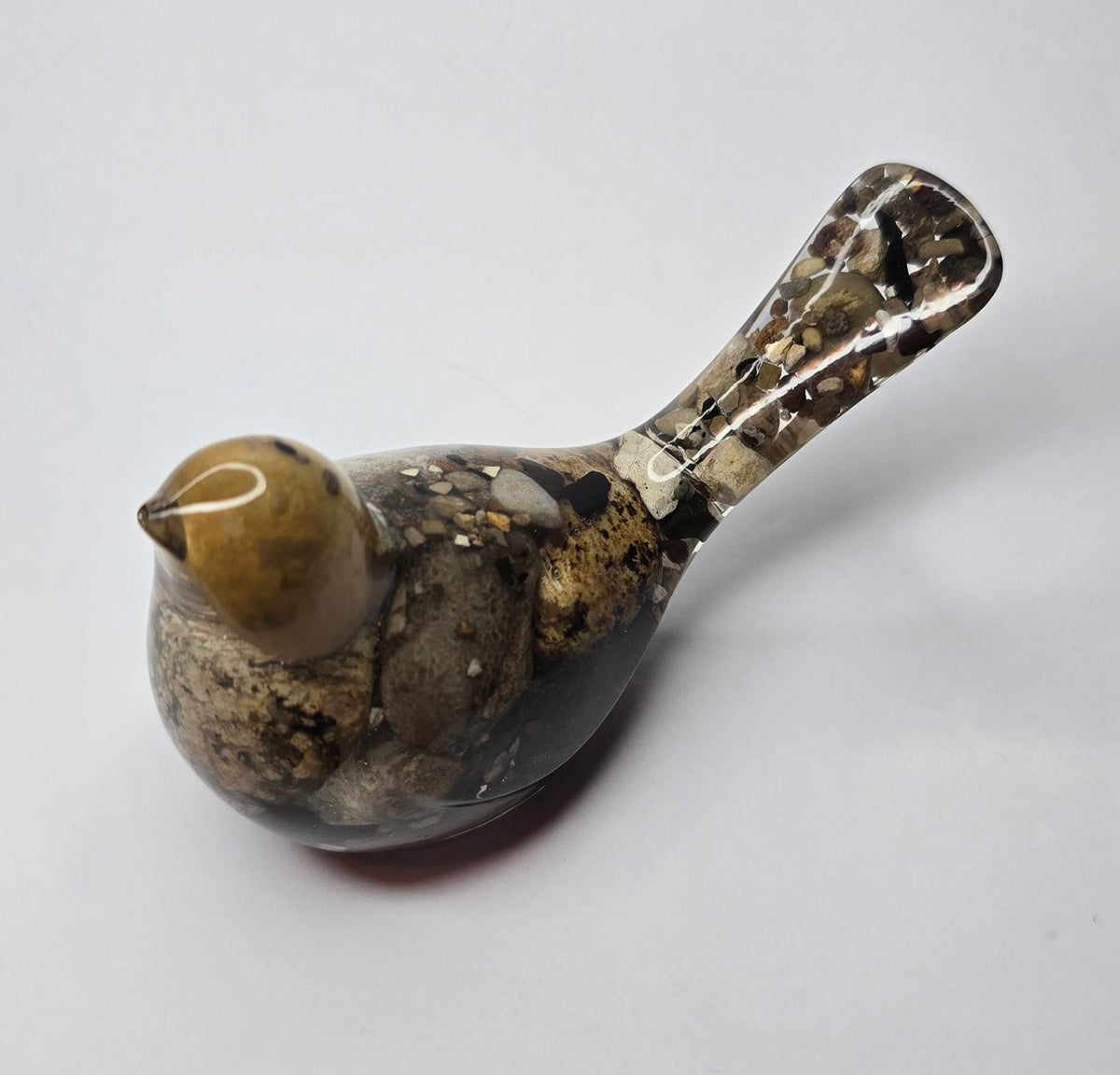 Rock collection bird with Petoskey stone