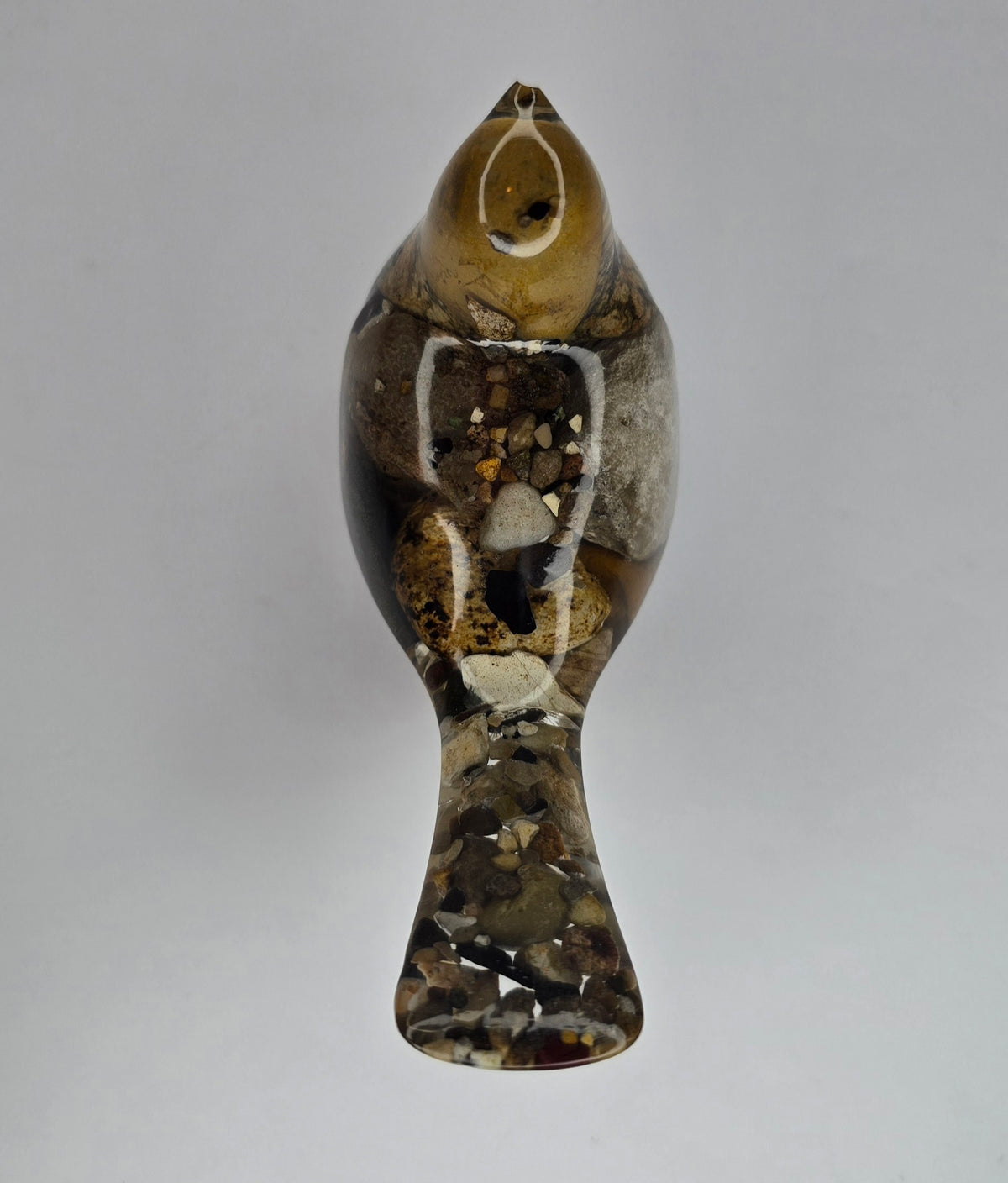 Rock collection bird with Petoskey stone