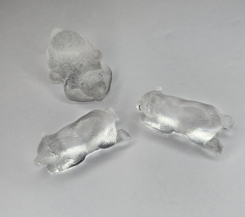 3 clear bear figurines