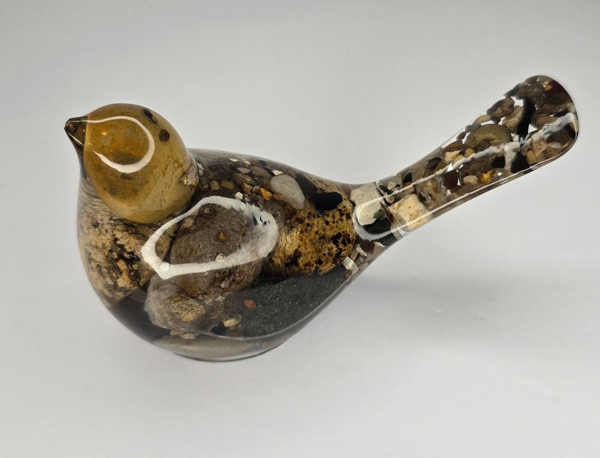 Rock collection bird with Petoskey stone